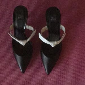 Black leather bow mules